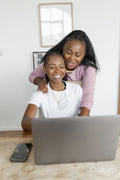 couple using laptop at home
