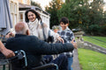 Family visiting senior man at nursing home