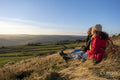 Female hikers looking at landscape