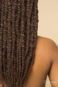 Close-up of woman with braided hair