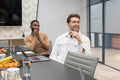Businessmen having meeting in conference room