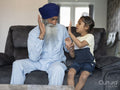Grandfather and grandson high fiving