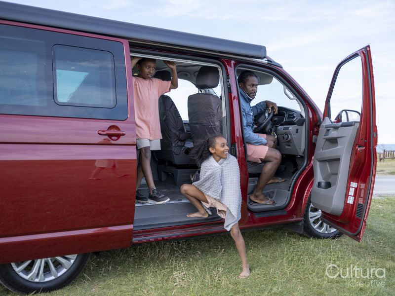 Father with children in van