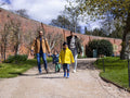 Parents with two sons in park