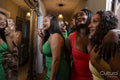 Group of women applying makeup before going to party