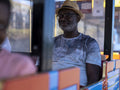 Senior man on land train tourist ride
