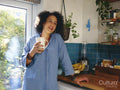 Portrait of woman in domestic kitchen
