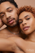 Studio portrait of happy young couple