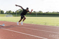 Athlete sprinting at running track