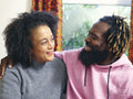 Couple embracing,looking at each other