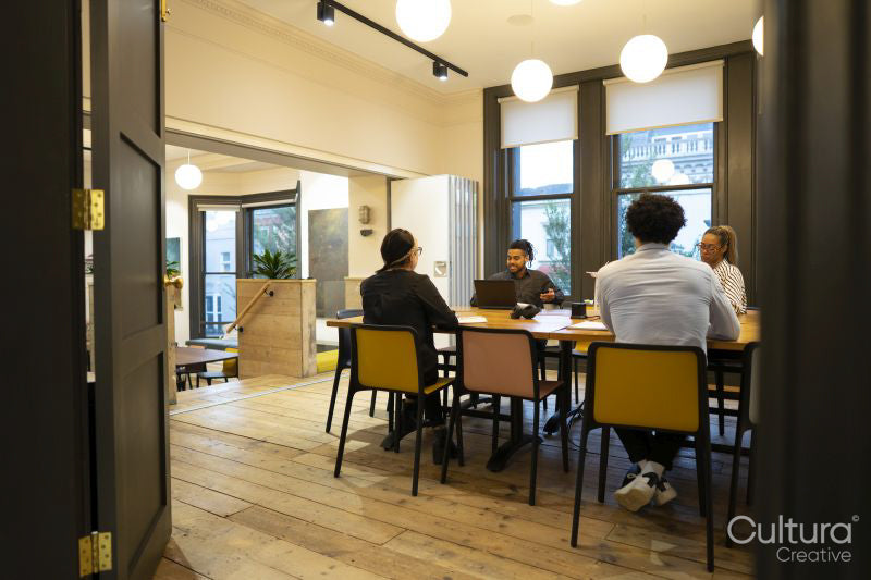 Business people having meeting in board room