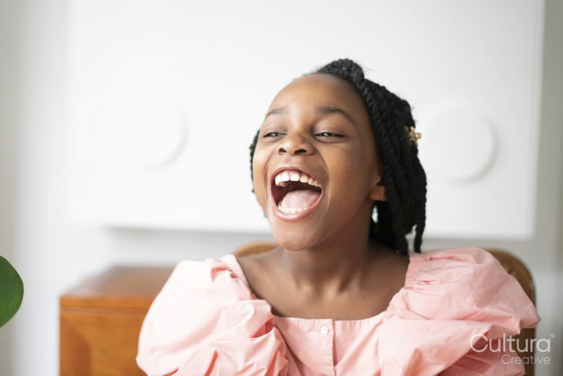 Headshot of laughing girl