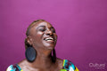 Studio shot of smiling woman