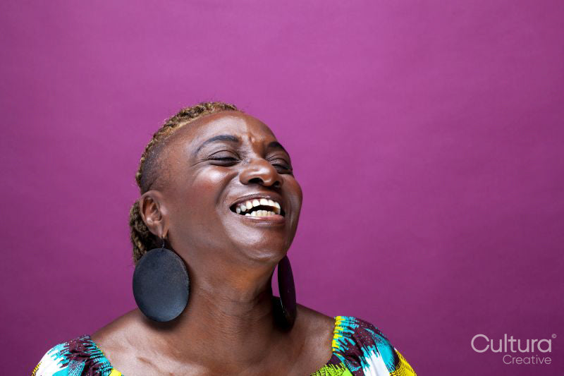 Studio shot of smiling woman