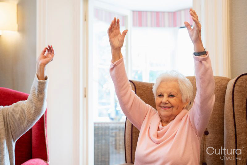 Senior woman exercising in nursing home