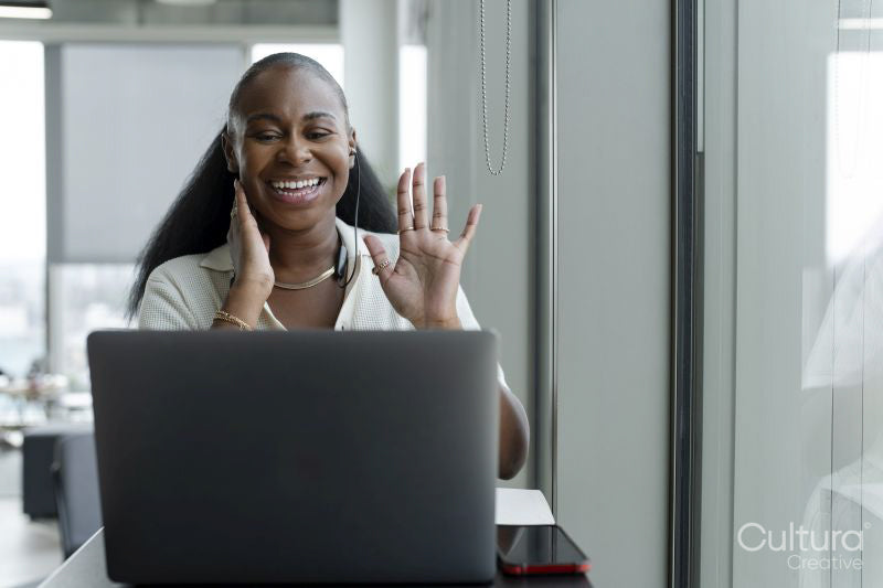 Businesswoman attending video conference in office