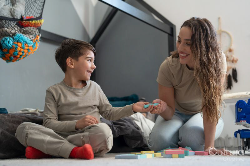Mother and son playing at home