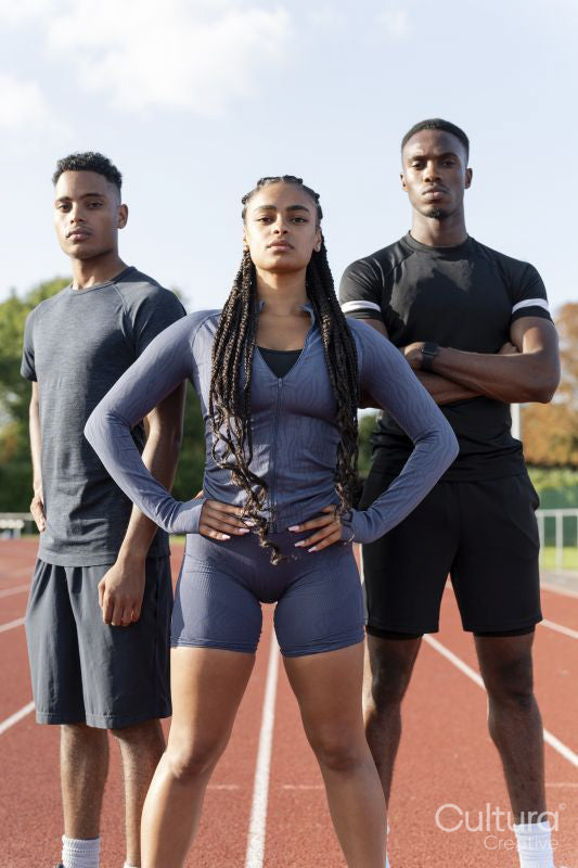 Group of athletes standing at sports track