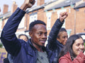 Protestors with hands raised