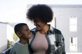Mother and son smiling to each other