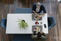 Male couple eating breakfast at home