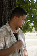 Portrait of man relaxing in park
