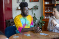Friends playing cards at home