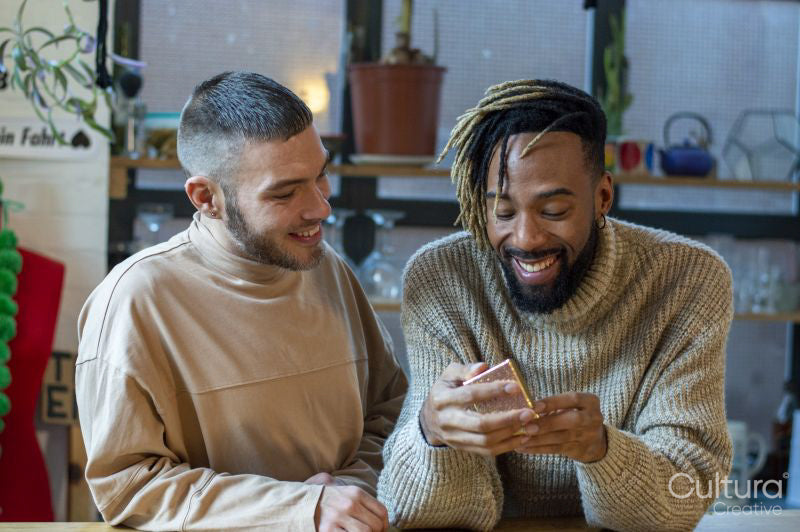 Man giving gift to friend