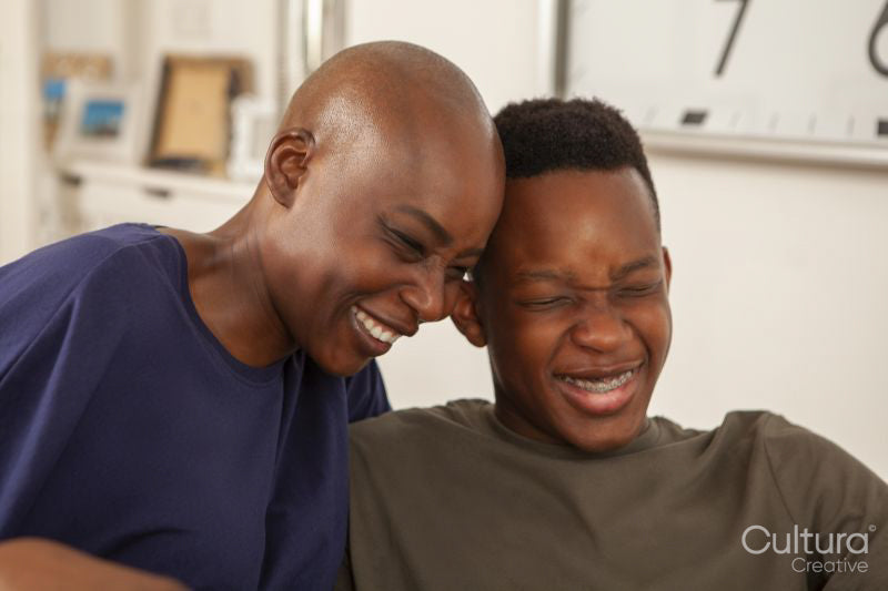 Mother and son laughing