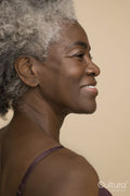 Profile of smiling mature woman