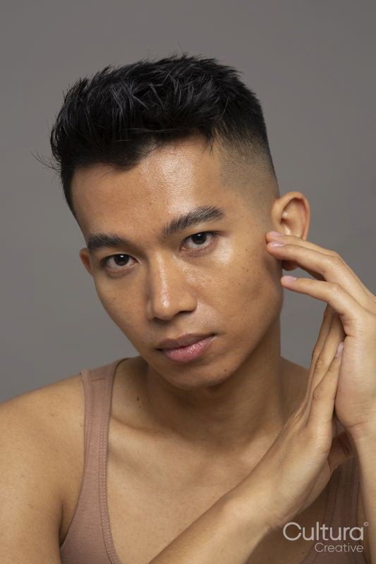 Studio portrait of pensive person