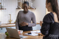 Women talking in kitchen
