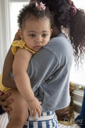Mother with baby daughter at home