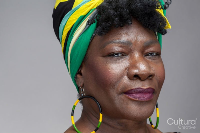 Studio portrait of mature woman wearing a headscarf
