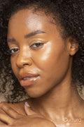 Close-up of woman with curly hair