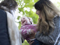 Couple with smiling baby in park