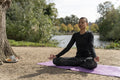 Woman meditating in park