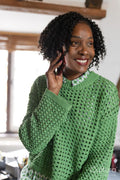 Portrait of smiling businesswoman talking by phone in office