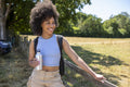 Portrait of young woman hiking in countryside