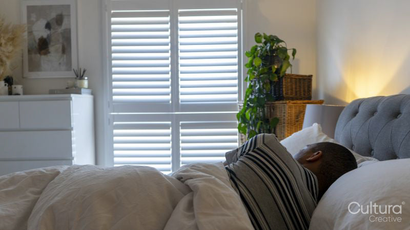 Man asleep in bedroom