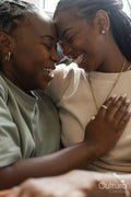 Portrait of smiling couple embracing at home