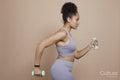 Woman exercising with dumbbells