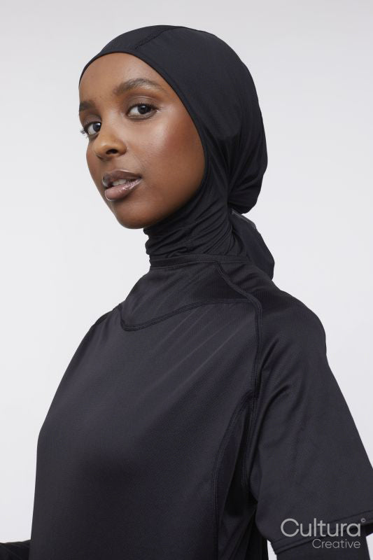 Studio portrait of young woman in hijab