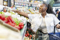 Young women grocery shopping together