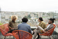 Creative professionals having meeting on office terrace