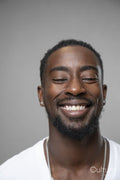 Portrait of smiling man with closed eyes