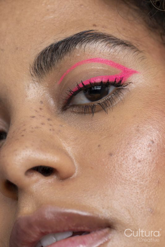 Close up of woman with pink makeup