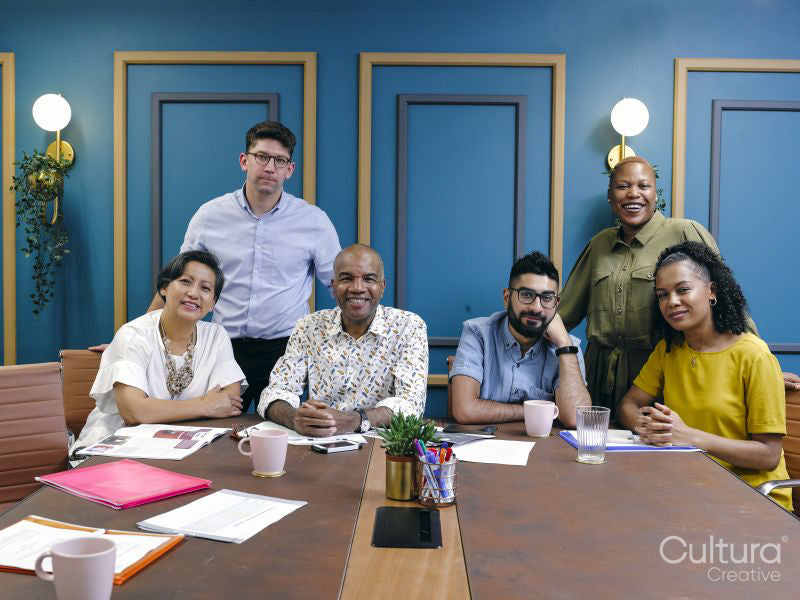 Group portrait of business people in office