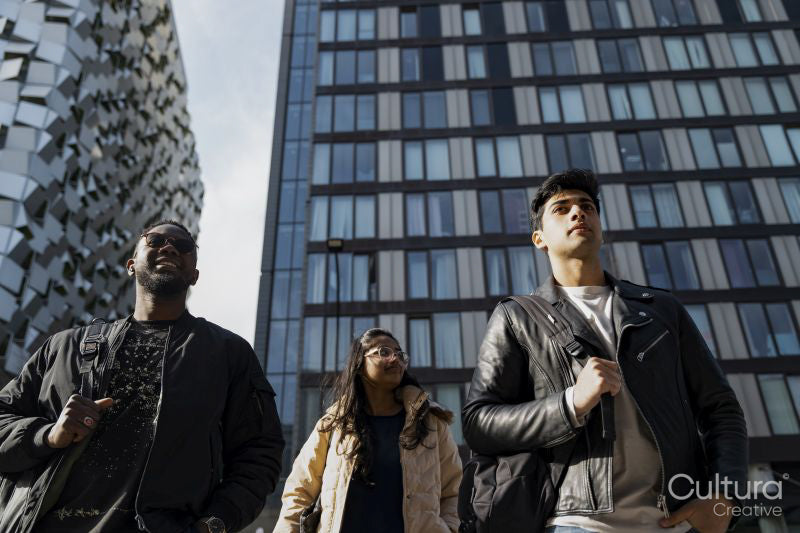 Student friends walking in city