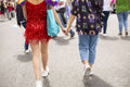 Low section of couple taking part in LGBT pride parade